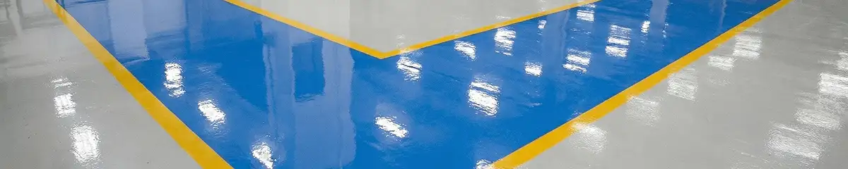 A factory floor professionally covered and marked with epoxy flooring in Little Rock, AR