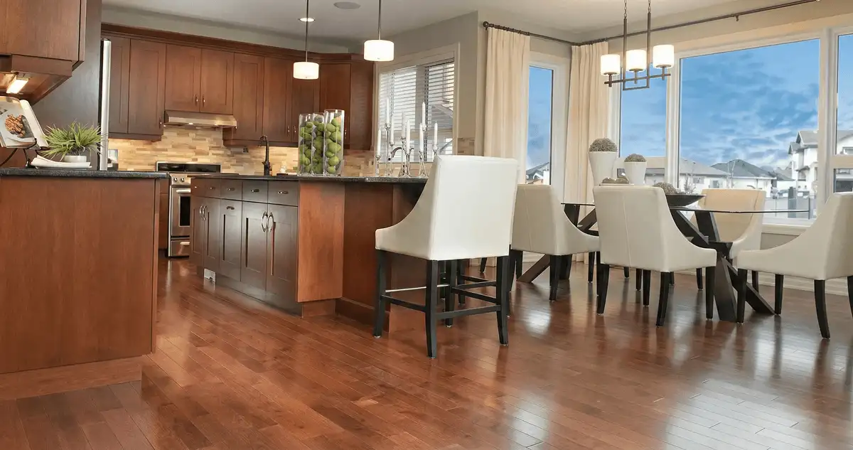 A modern kitchen with professionally installed wood flooring in Little Rock, AR
