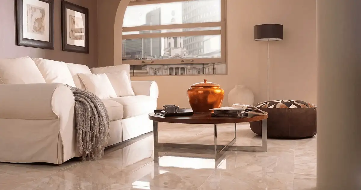 Modern living room with professionally installed marble flooring, a beige sofa, coffee table in Little Rock, AR