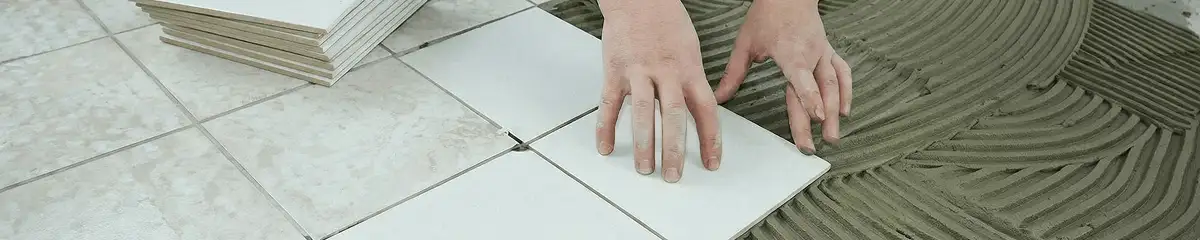 Professional installing white tile floors in Little Rock, AR