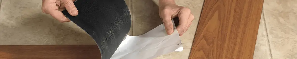 A professional installing vinyl flooring in Little Rock, AR